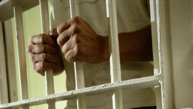 25 de gardieni, condamnaţi la câte 624 de ani de închisoare pentru uciderea unor deţinuţi