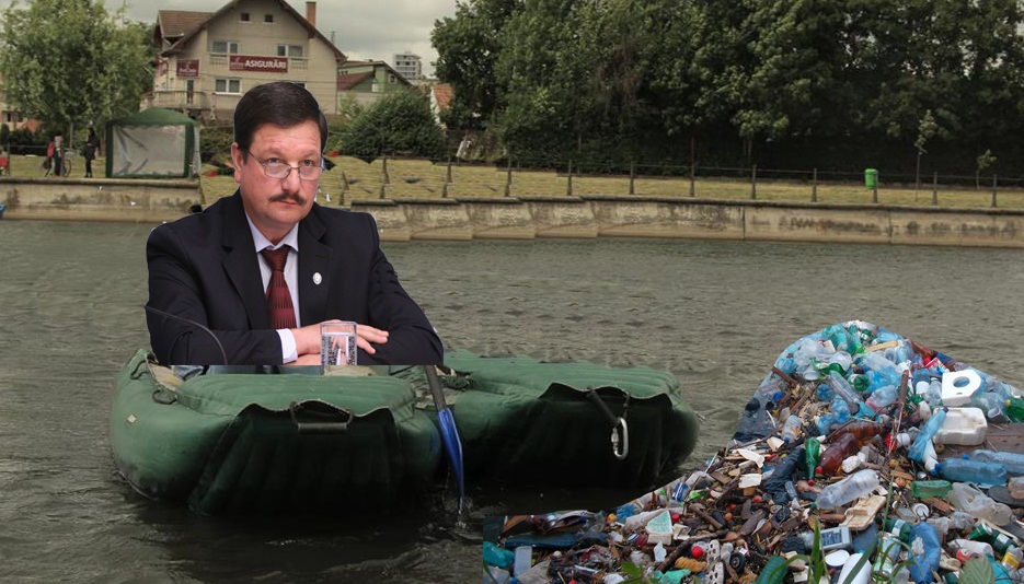 City-managerul Șurubaru, trimis de Boc să urce în barcă și să adune gunoaiele de pe Someș