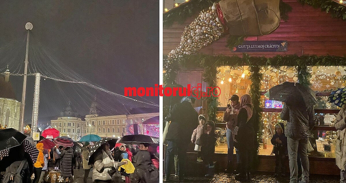În ciuda furtunii de afară, clujenii s-au „înarmat” cu umbrele și haine groase și s-au adunat în Piața Unirii/ FOTO: monitorulcj.ro