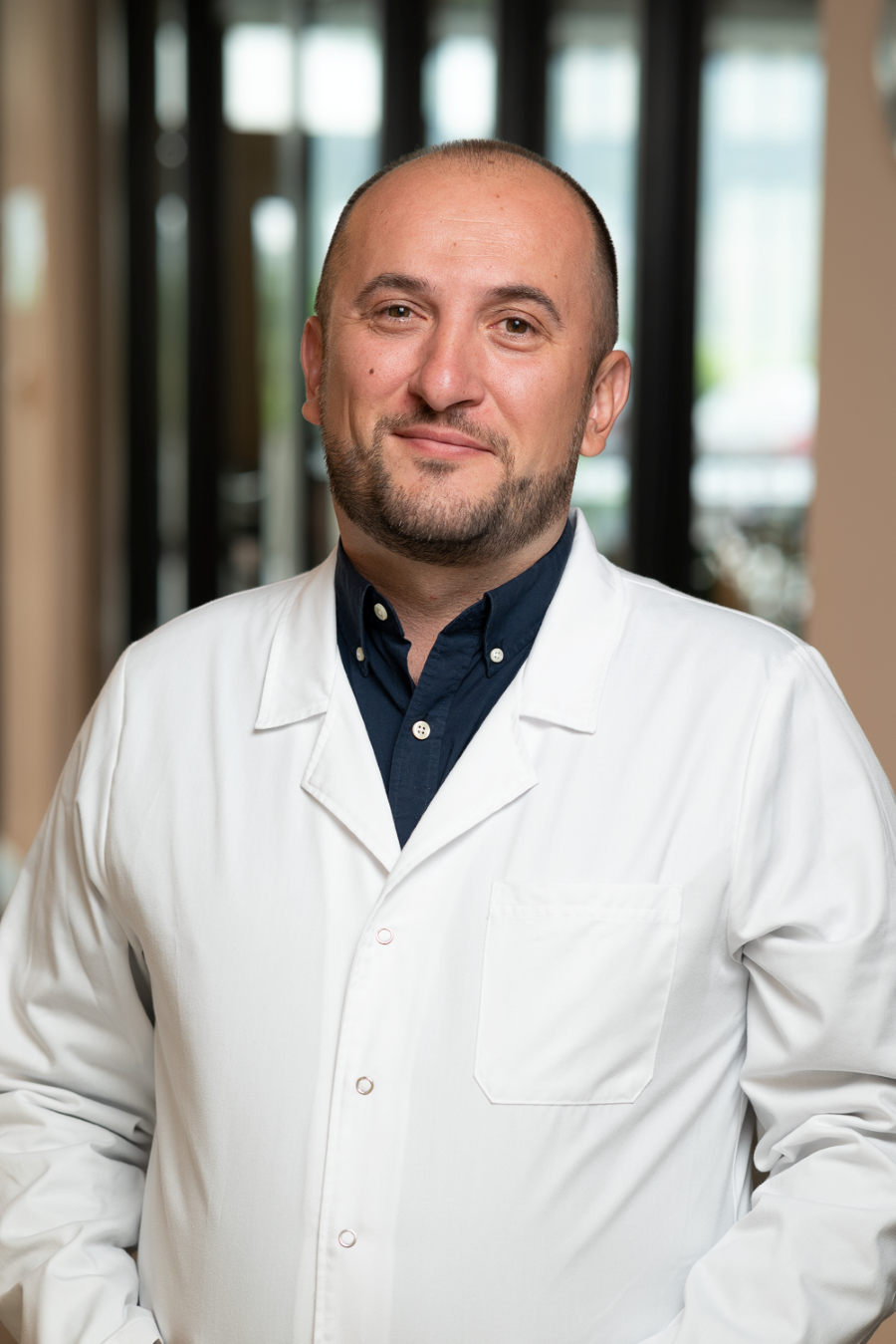 Dr. Adrian Bartos